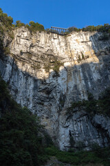 A glass platform at the top of a cliff in Wulong National Geological Park in Chongqing, China.