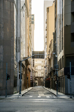 Narrow City Alley with Classical Architecture