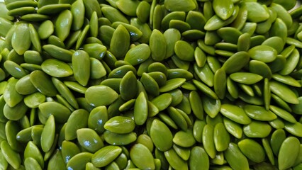 pile of fresh raw green vegetable grains. Leucaena seeds (1)
