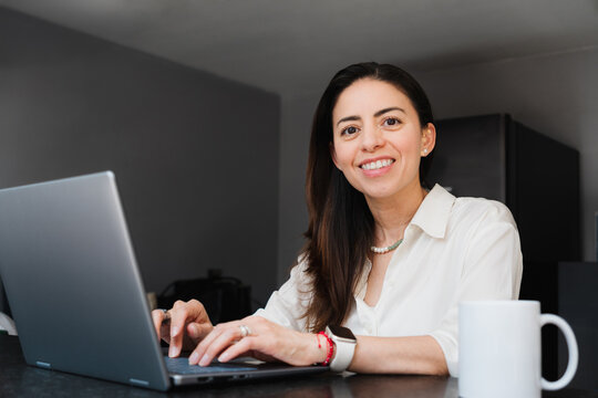 Happy woman doing home office.