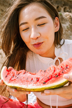Enjoying fresh watermelon on a sunny day