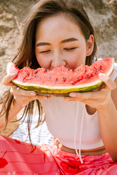 Enjoying fresh watermelon on a sunny day