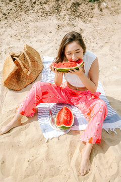 Enjoying fresh watermelon on a sunny day