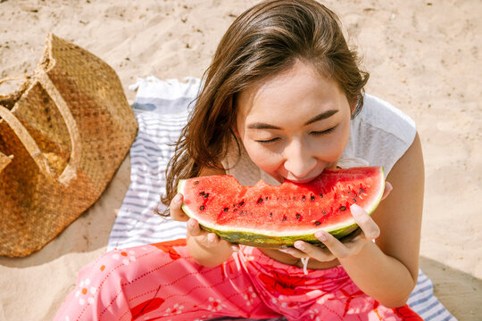 Enjoying fresh watermelon on a sunny day