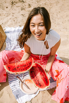 Enjoying fresh watermelon on a sunny day