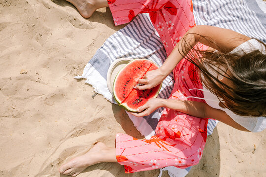 Enjoying fresh watermelon on a sunny day