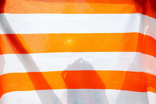 A girl's shadow on a bright background