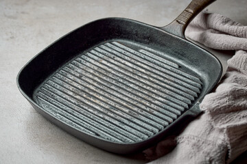 empty grill pan and linen towel
