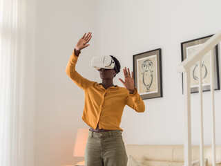 Woman enjoying VR video game 