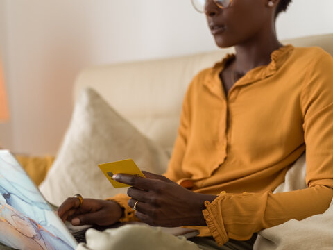 Woman holding credit card 