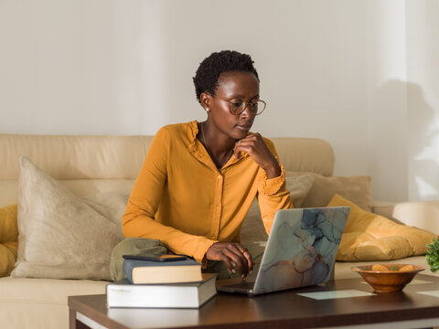 Focused woman thinking on project