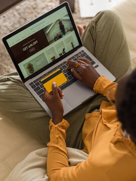 Woman shopping online for home decor 