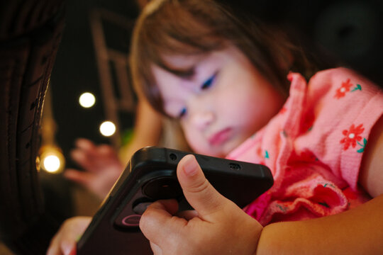 Girl using smartphone at home