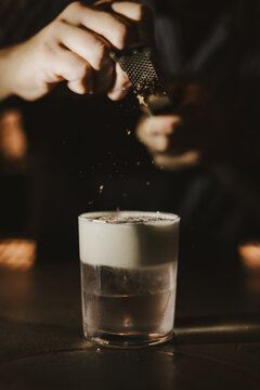 Bartender Garnishing Cocktail