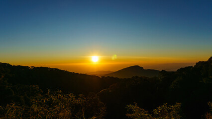 Sunrise with green mountains or tropical forest in Chiang Mai Thailand.