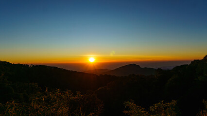 Sunrise with green mountains or tropical forest in Chiang Mai Thailand.