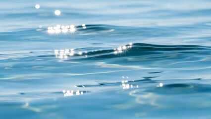 Sparkling Cerulean Water Ripples with Sun Glare - Abstract Blue Sea Surface Background