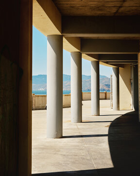 Columns Supporting a Walkway With a View of Distant Mountains