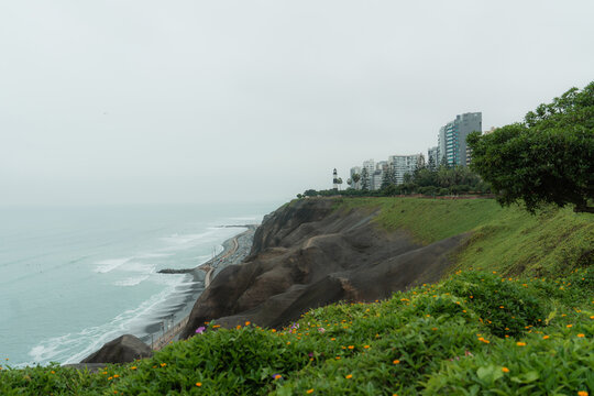 Lushly green hills  above the ocean in Lima, Peru  - Powered by Adobe