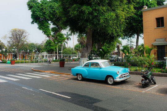 Vintage car in old colonial town in Peru