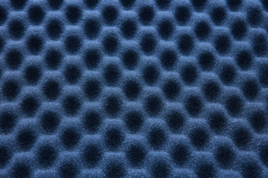 Top view of dark foam with blue tone