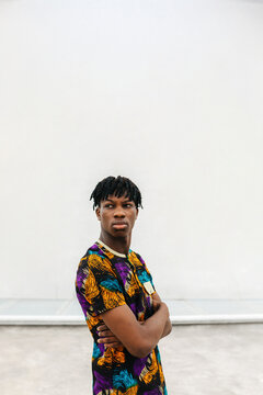 Young man posing in colorful shirt portrait