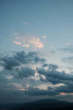 Cloudy sky above a mountain