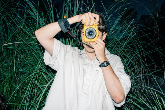 Casual Outdoor Photography Session in a Green Setting