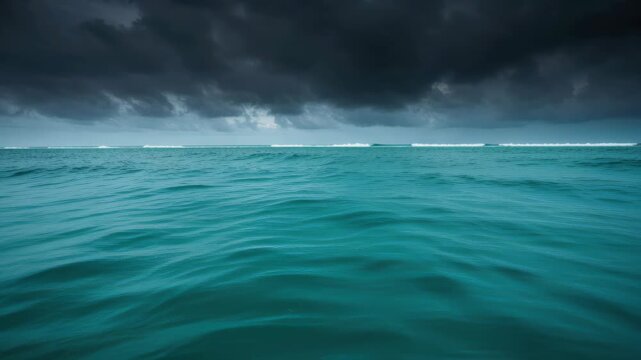 Ominous Ocean: The boundless ocean under a sky heavy with foreboding clouds, with waves rolling in the distance, evokes a sense of vastness and the raw power of nature.