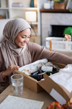 Small business owner happy to receive new product line
