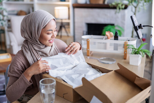 Content creator unboxing package for online video