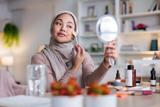 Woman testing new makeup 
