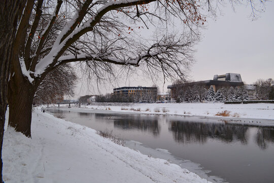 A snowy winter day along the bank of the Uzh River in Uzhhorod, Ukraine.