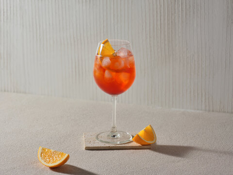 Aperol spritz served with ice and orange slices