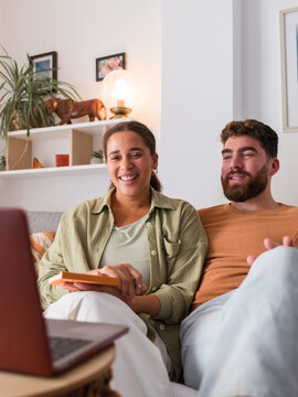 Couple enjoying online therapy session