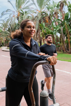 Woman training on ski walking machine 