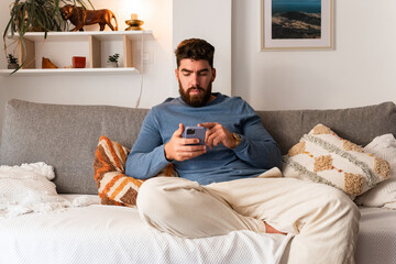 Man browsing internet on smartphone