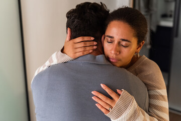 Emotional Embrace Between Partners During Difficult Times