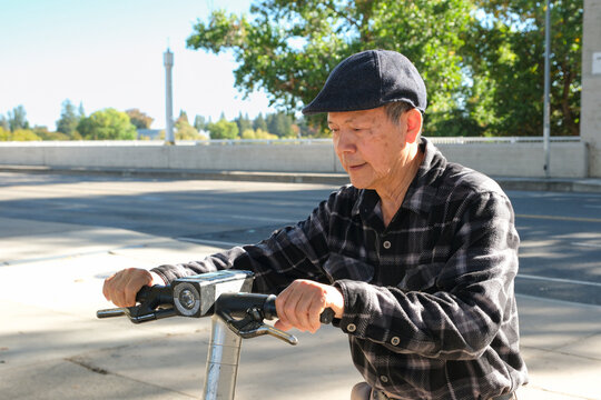 retired man using scooter 