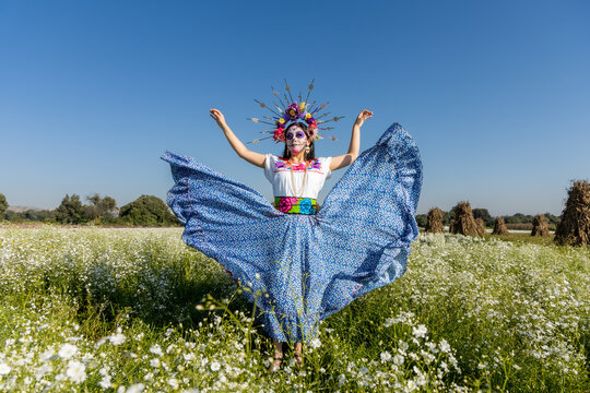 Portrait of a model dressed as a traditional Mexican catrina