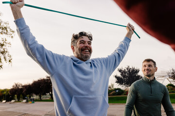 Mature adult training their physical strength outdoors