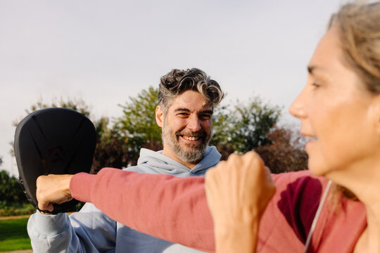 Active elderly couple trains in martial arts to improve their vitality