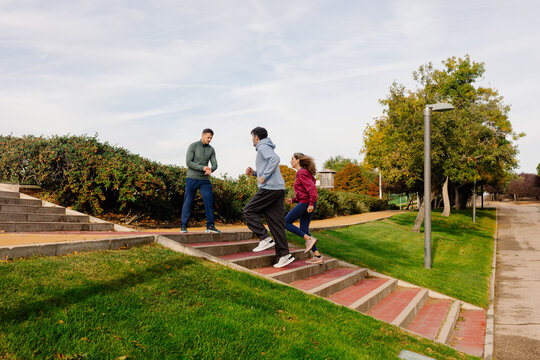 Certified coach guides active seniors through cardio exercises