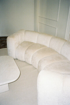 Curved modern boucle sofa styling contemporary living room
