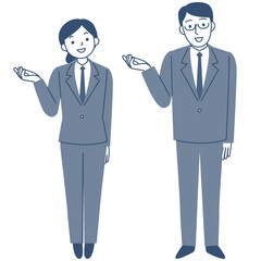 スーツを着て案内する若い女性と男性