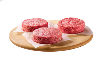 cutting board with raw ground beef patties for hamburgers isolated on white background.