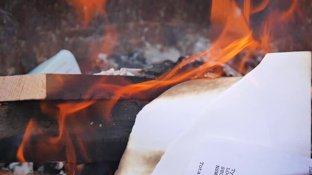 Paper burning in a fire