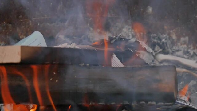 Paper and wood burning on a fire