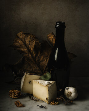 Still Life with Cheese, Garlic, Flowers, and Insects.