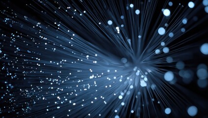 Naklejka premium Close-up of glowing fiber optic strands radiating outward with bokeh highlights